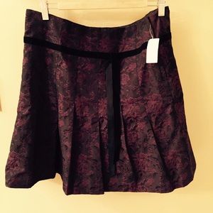 NWT Black Pleated Skirt with floral design